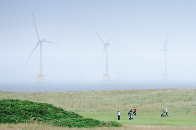 wind turbines off the coast of Scotland