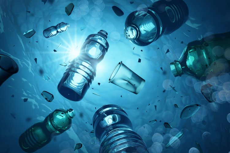 Plastic bottles and cups floating around underwater